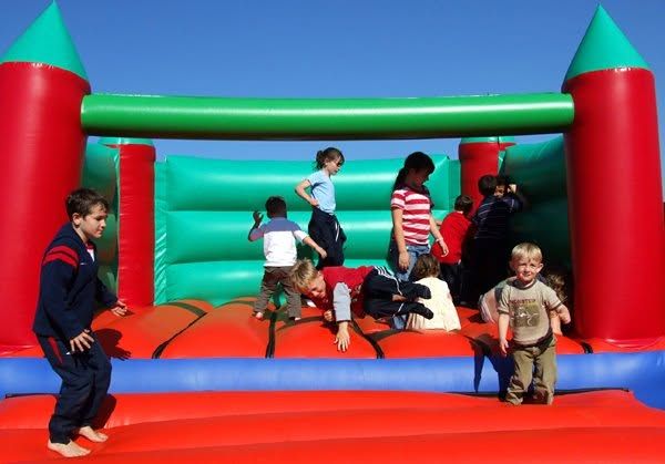 Kids jumping on a bouncy castle