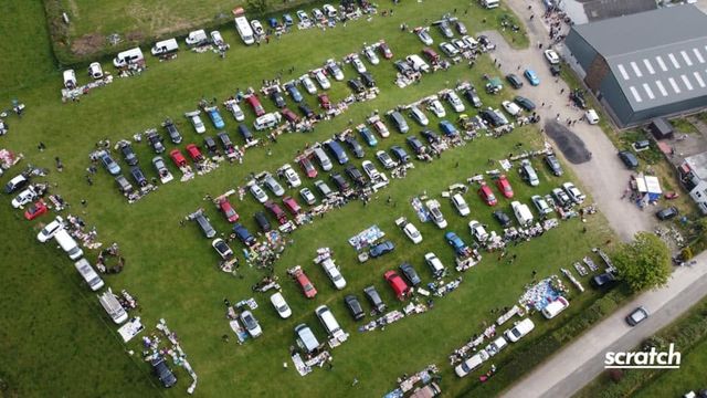 Aerial view of rows of cars at a car boot sale