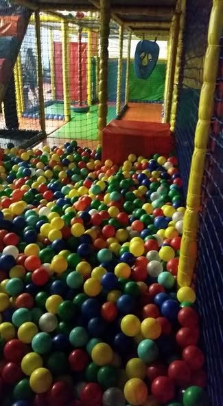 A ball pit full of coloured balls