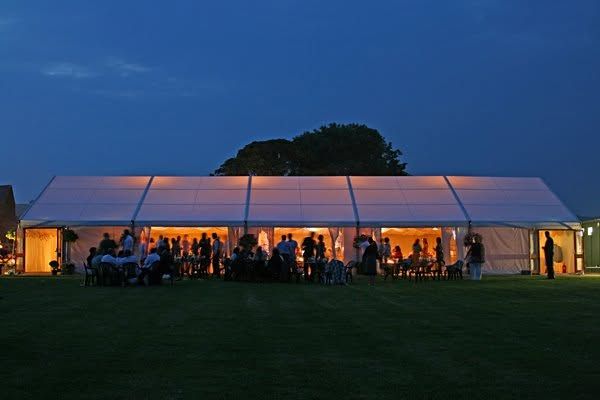 The marquee lit up at dusk